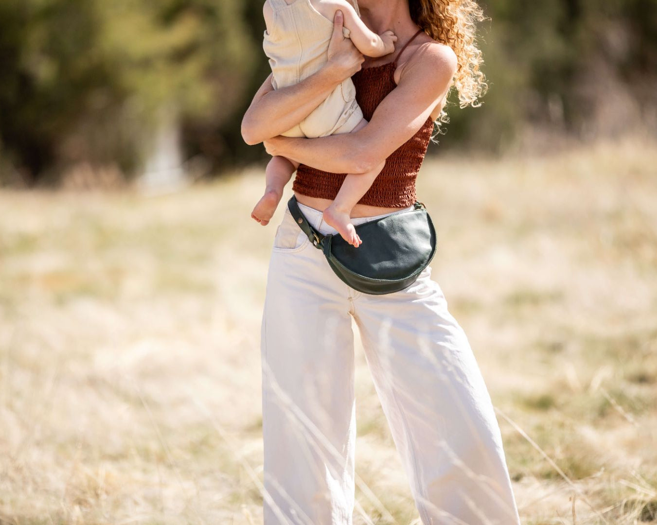 Small dark green leather bag