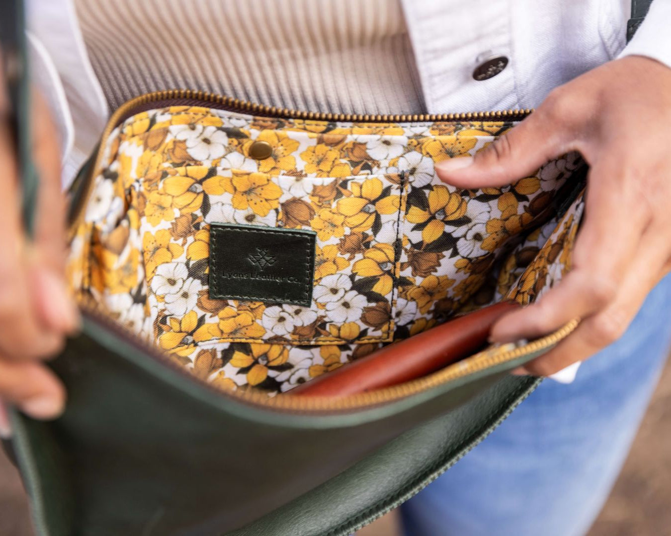 Large dark green leather bag