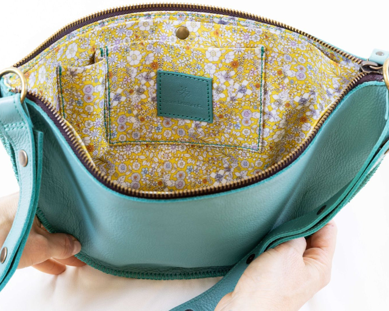 Small turquoise leather bag