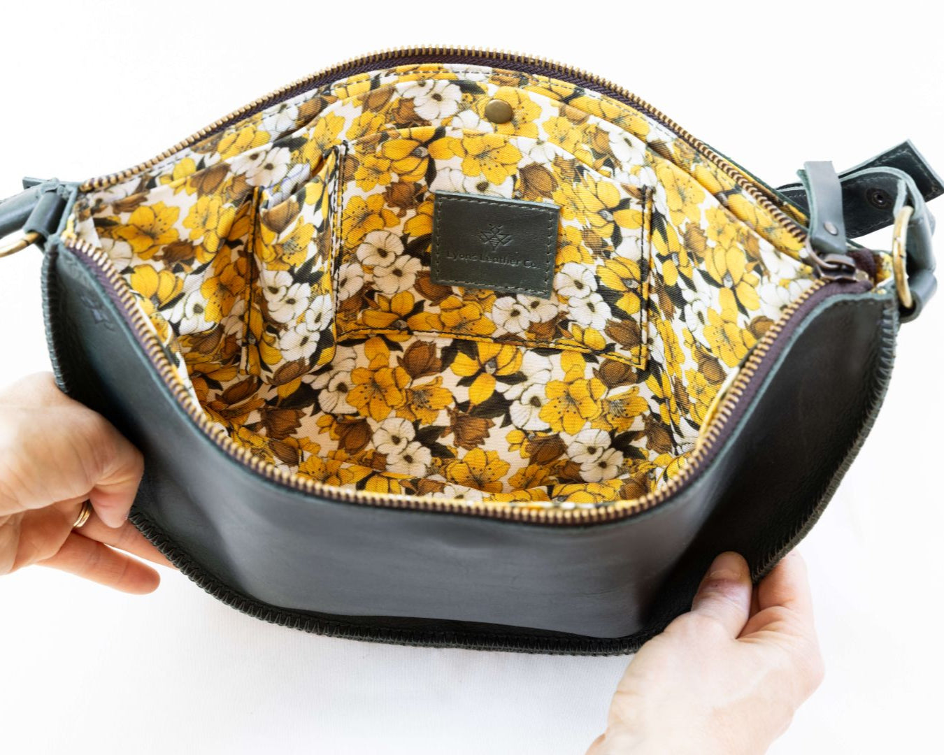 Small dark green leather bag