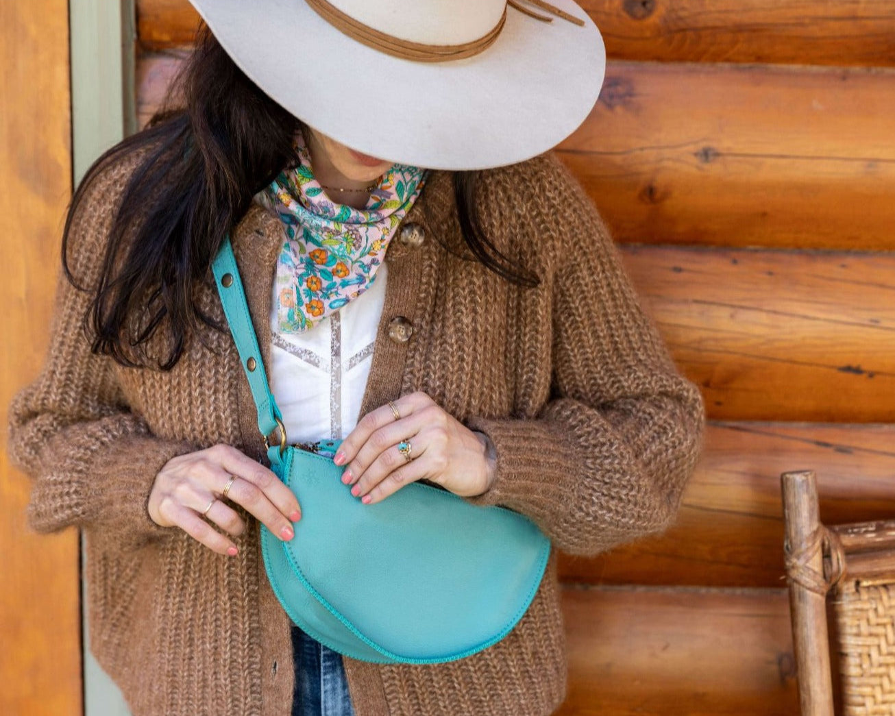 Small turquoise leather bag