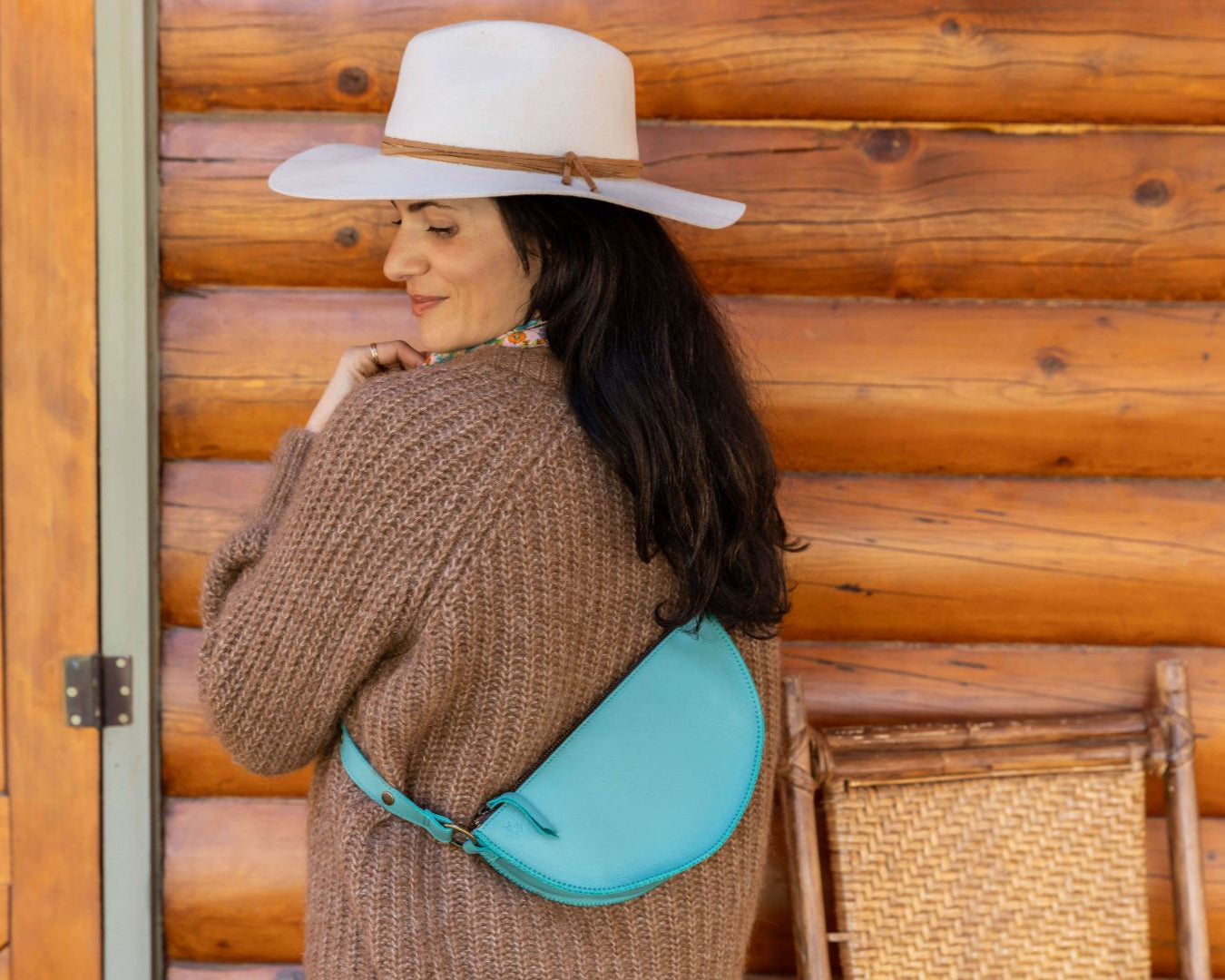 Small turquoise leather bag