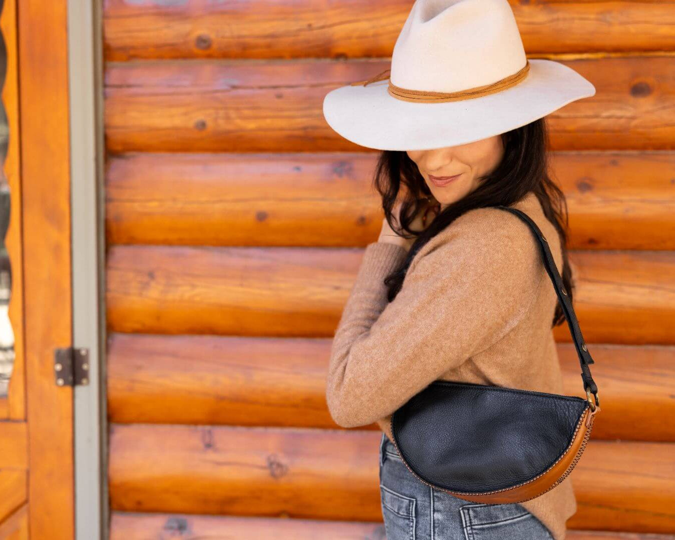 Small black and brown leather bag