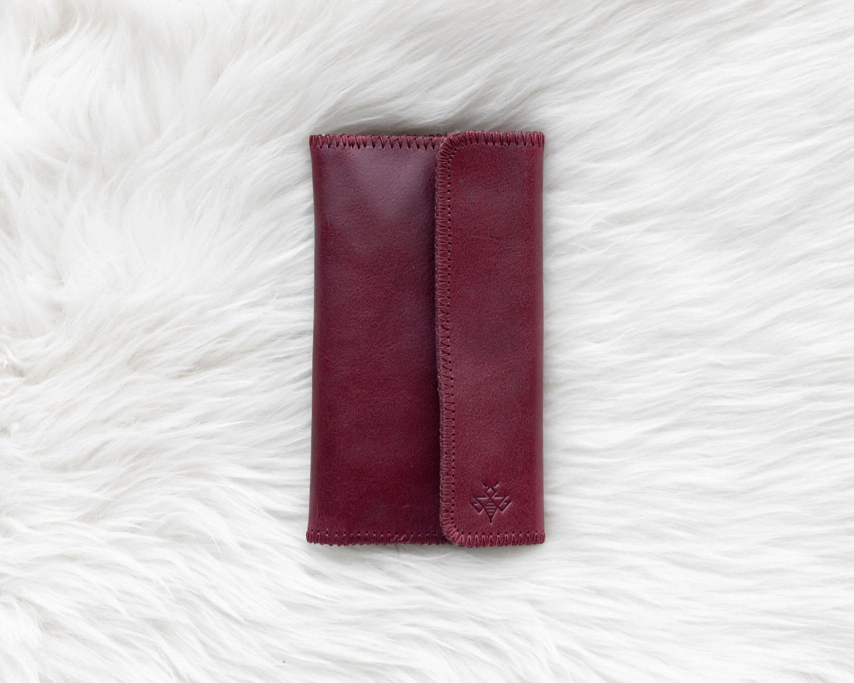 Cherry red leather wallet for traveling