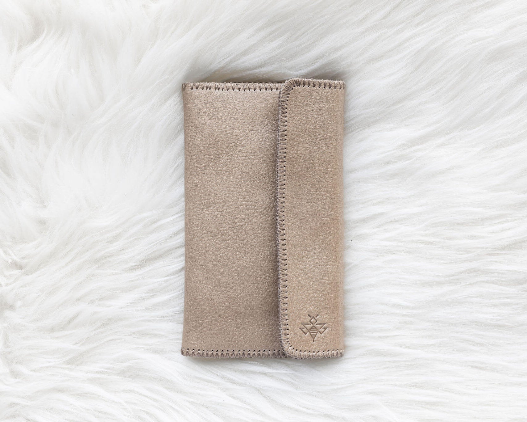 Light tan leather wallet for traveling