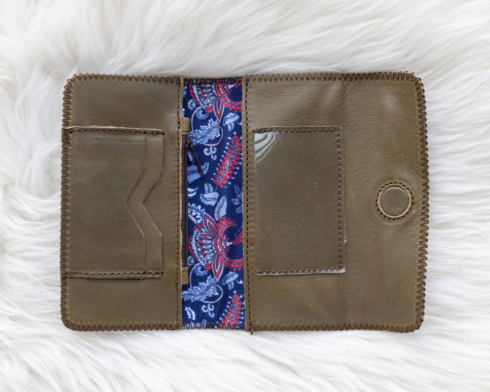 Sage green leather wallet for traveling
