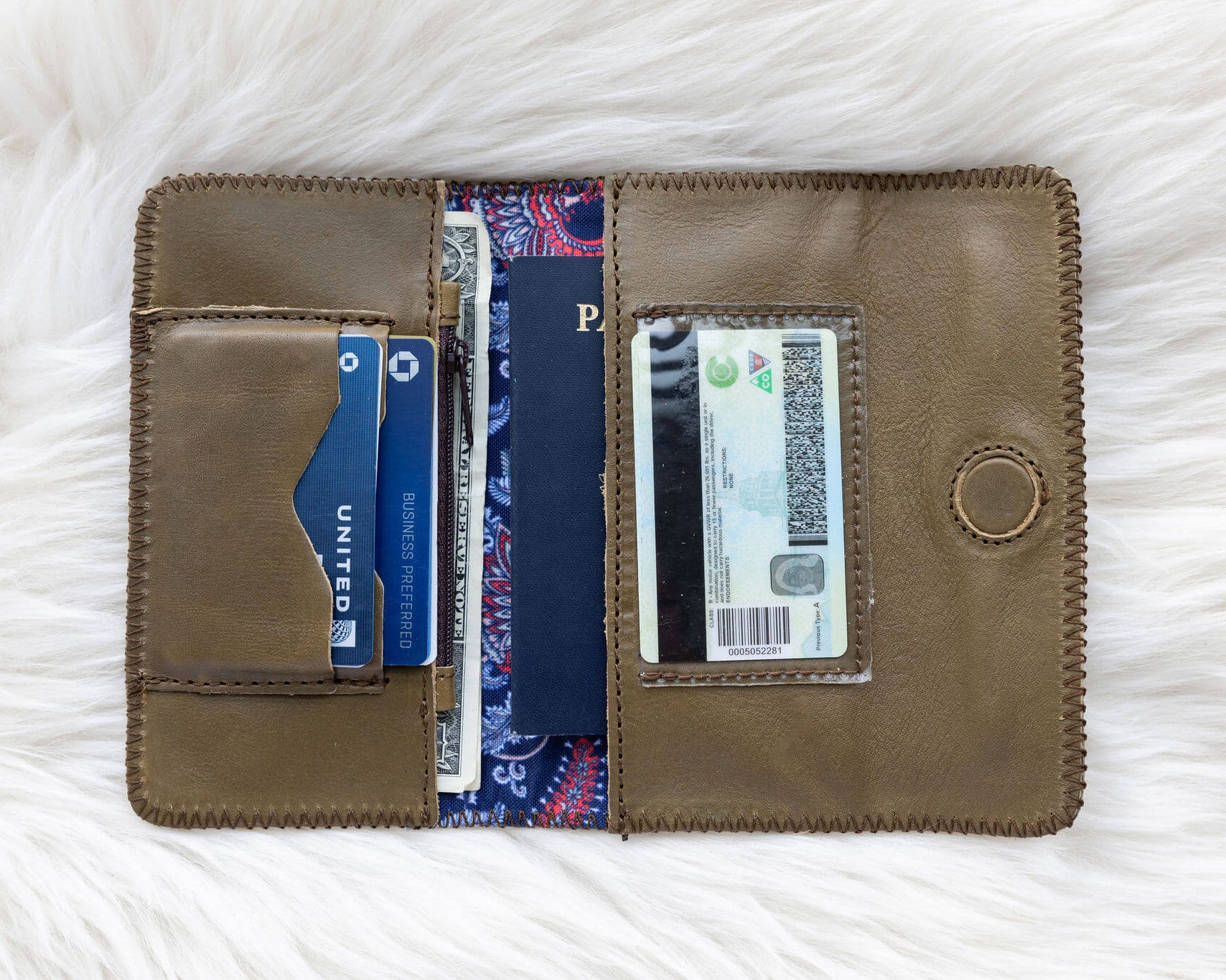 Sage green leather wallet for traveling