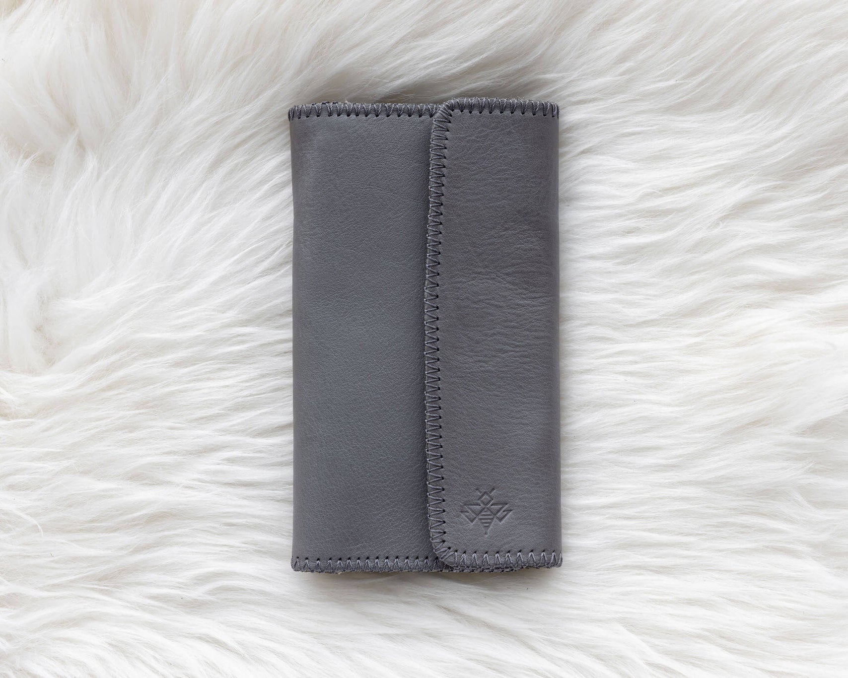 Dark grey leather wallet for traveling
