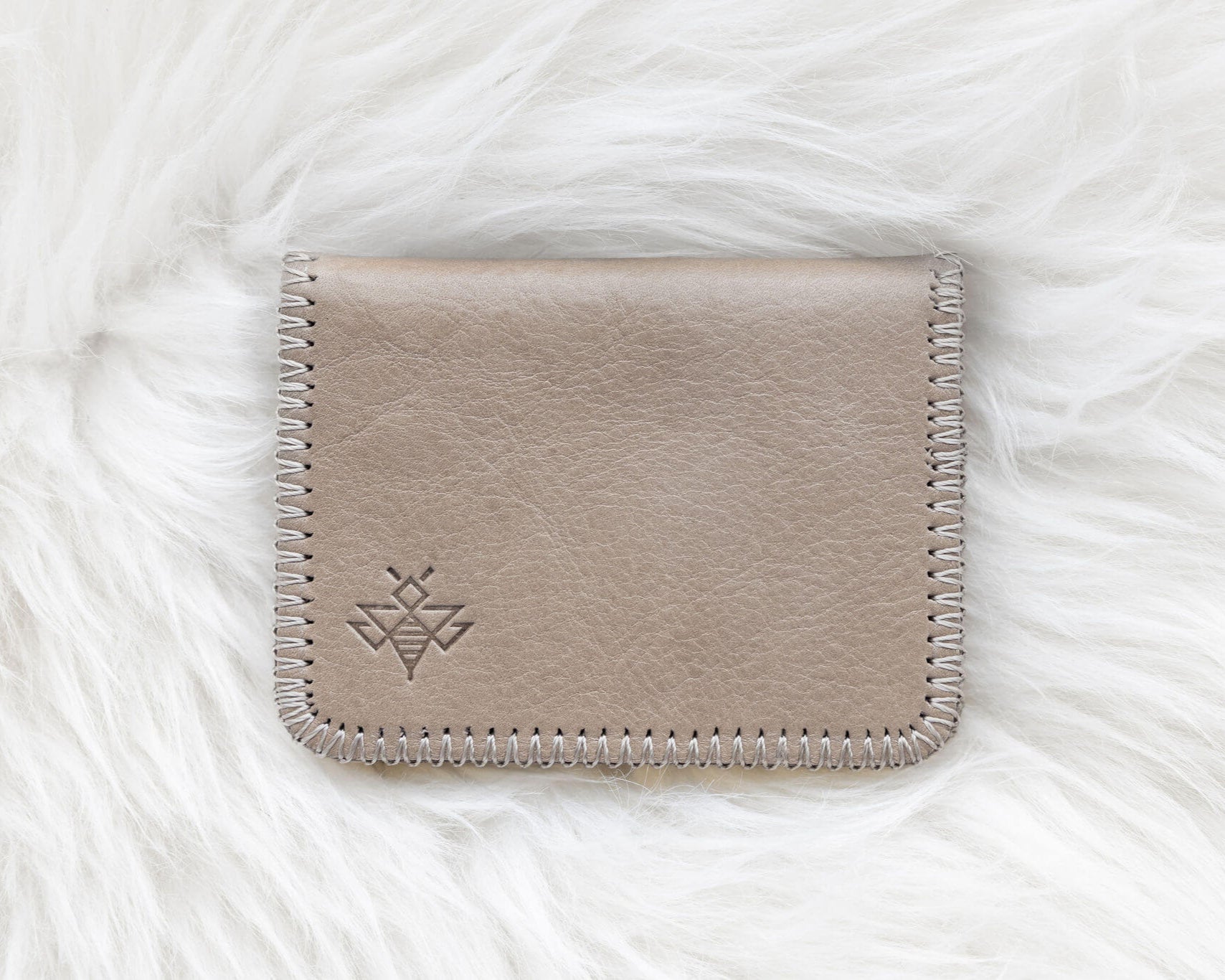 Small light tan leather wallet