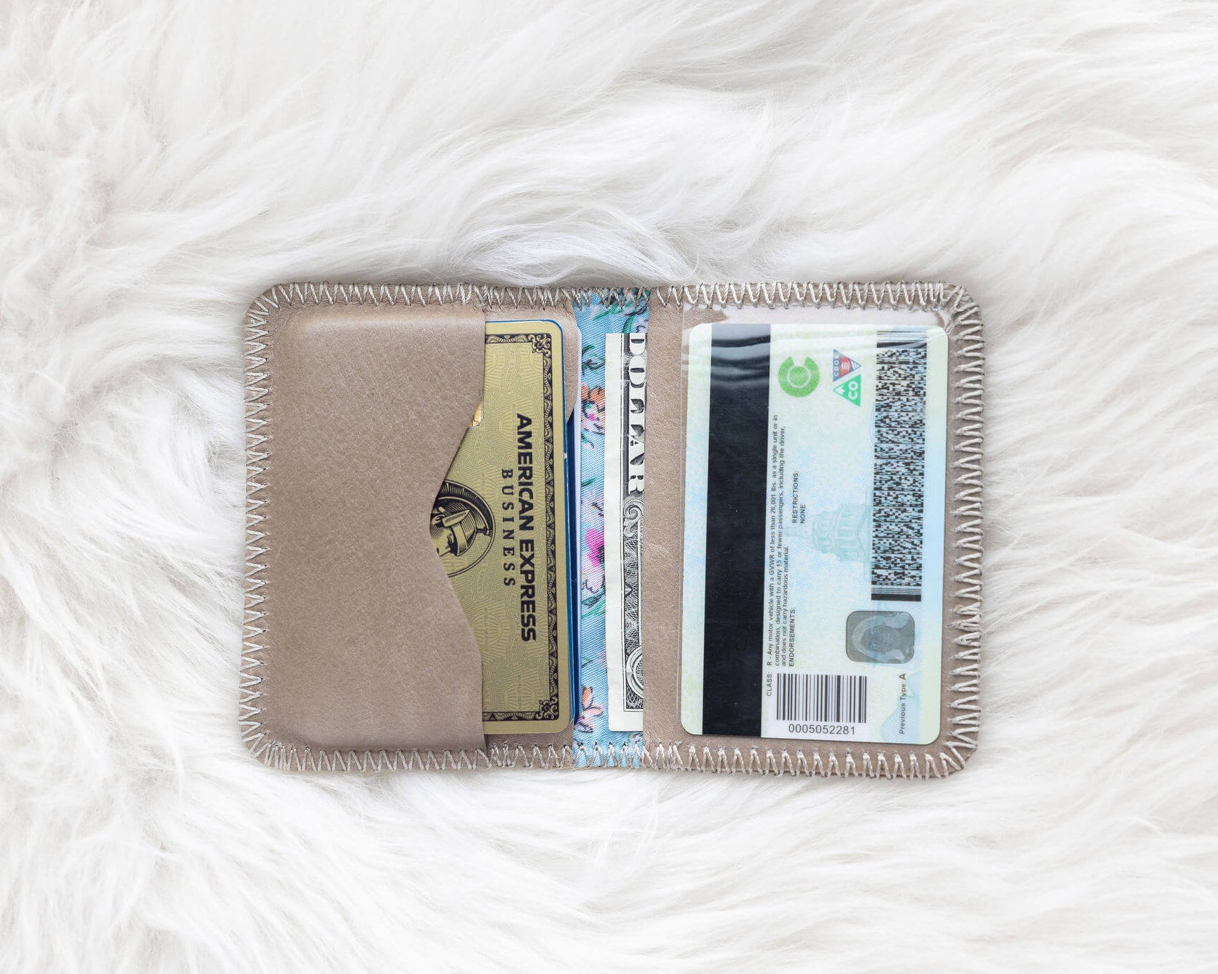 Small light tan leather wallet