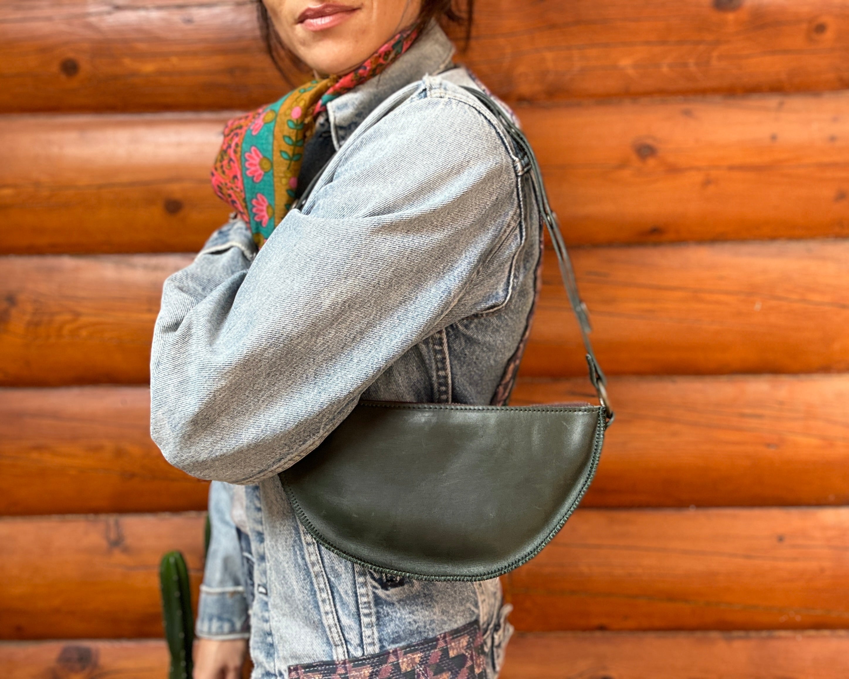 Small dark green leather bag