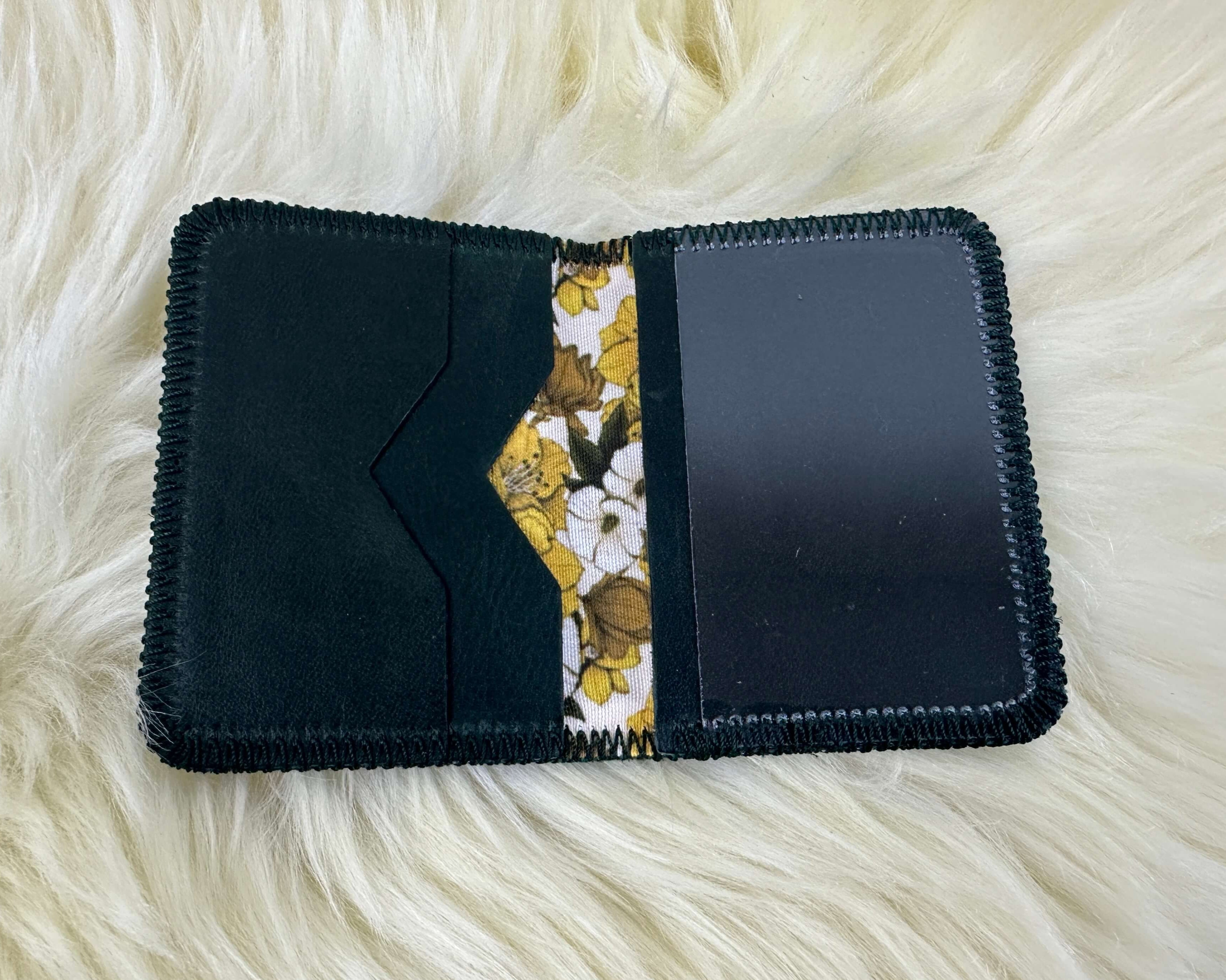 Small dark green leather wallet