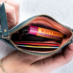 Mini teal leather pouch