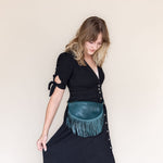 Small teal leather fringe pouch, belt bag
