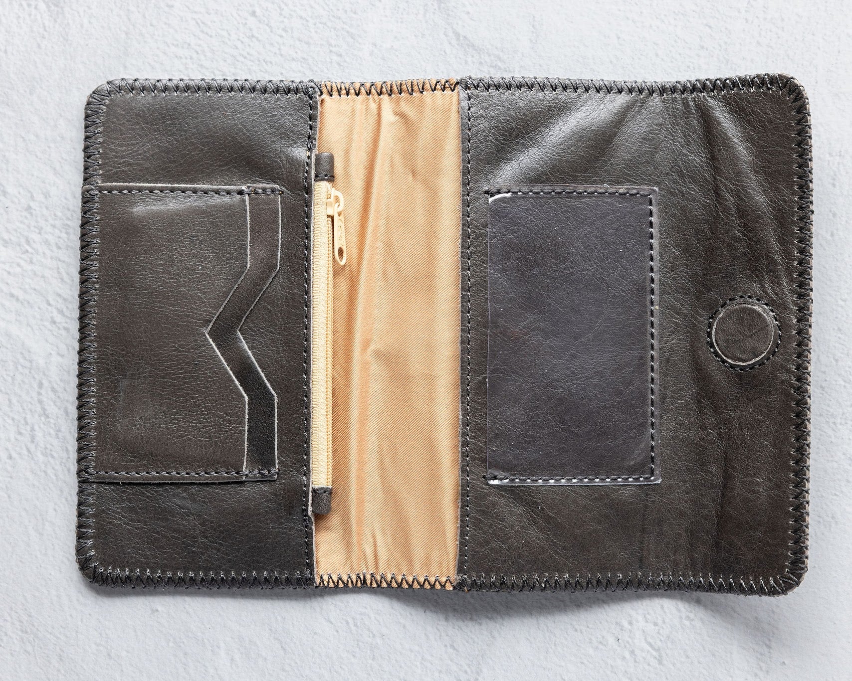 Charcoal leather wallet for traveling