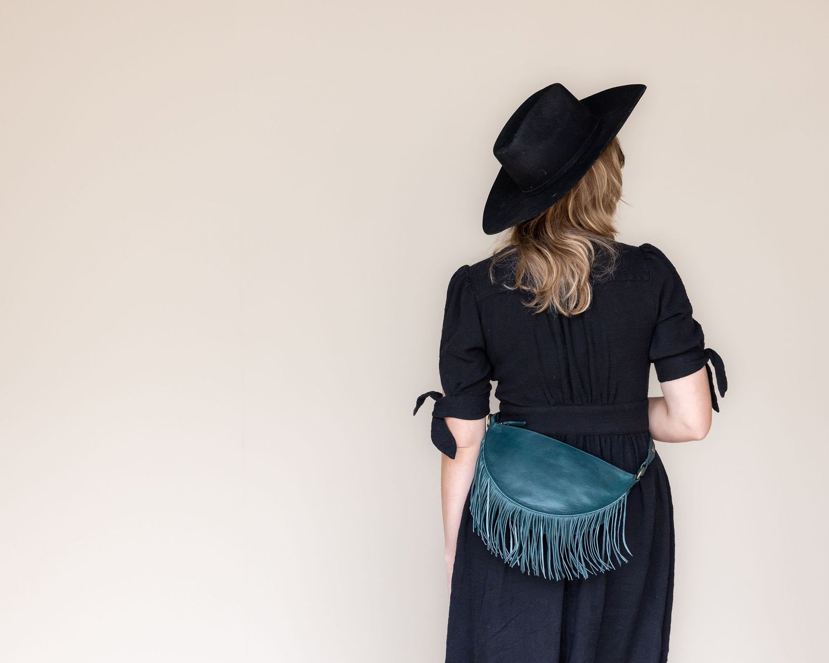 Medium teal leather fringe belt bag