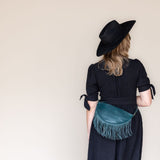 Medium teal leather fringe belt bag
