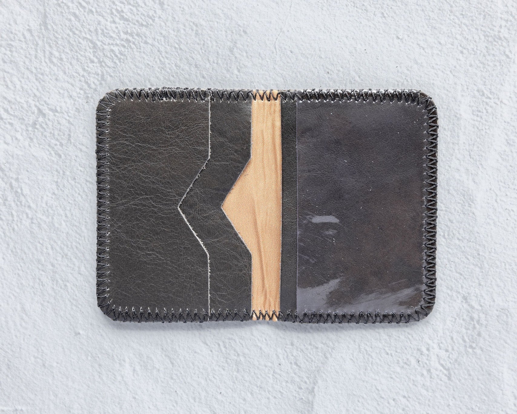 Small charcoal leather wallet