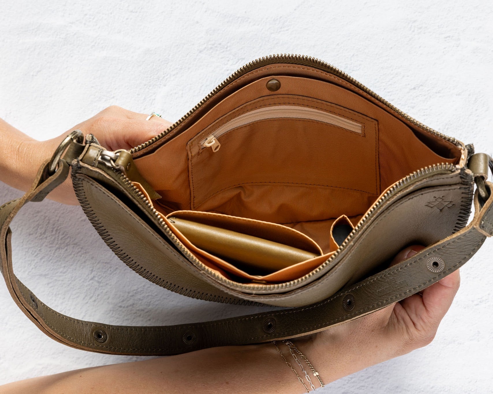 Interior and strap of the Woven Sage & Espresso Biggie Bee