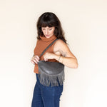 Small charcoal leather fringe bag, side view