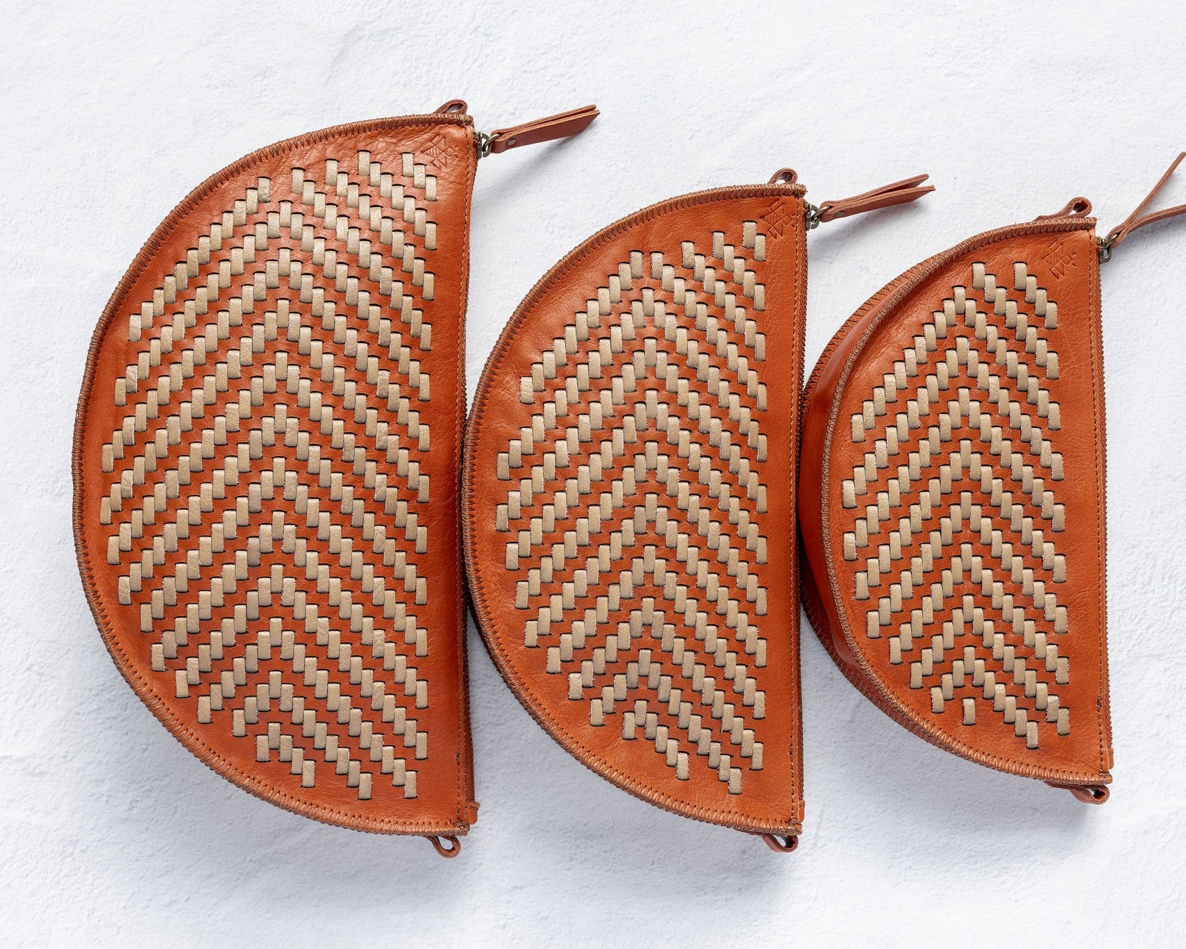 Size comparison of the Bee, Biggie Bee, and Queen Bee in Woven Terracotta & Seashell
