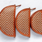 Size comparison of the Bee, Biggie Bee, and Queen Bee in Woven Terracotta & Seashell