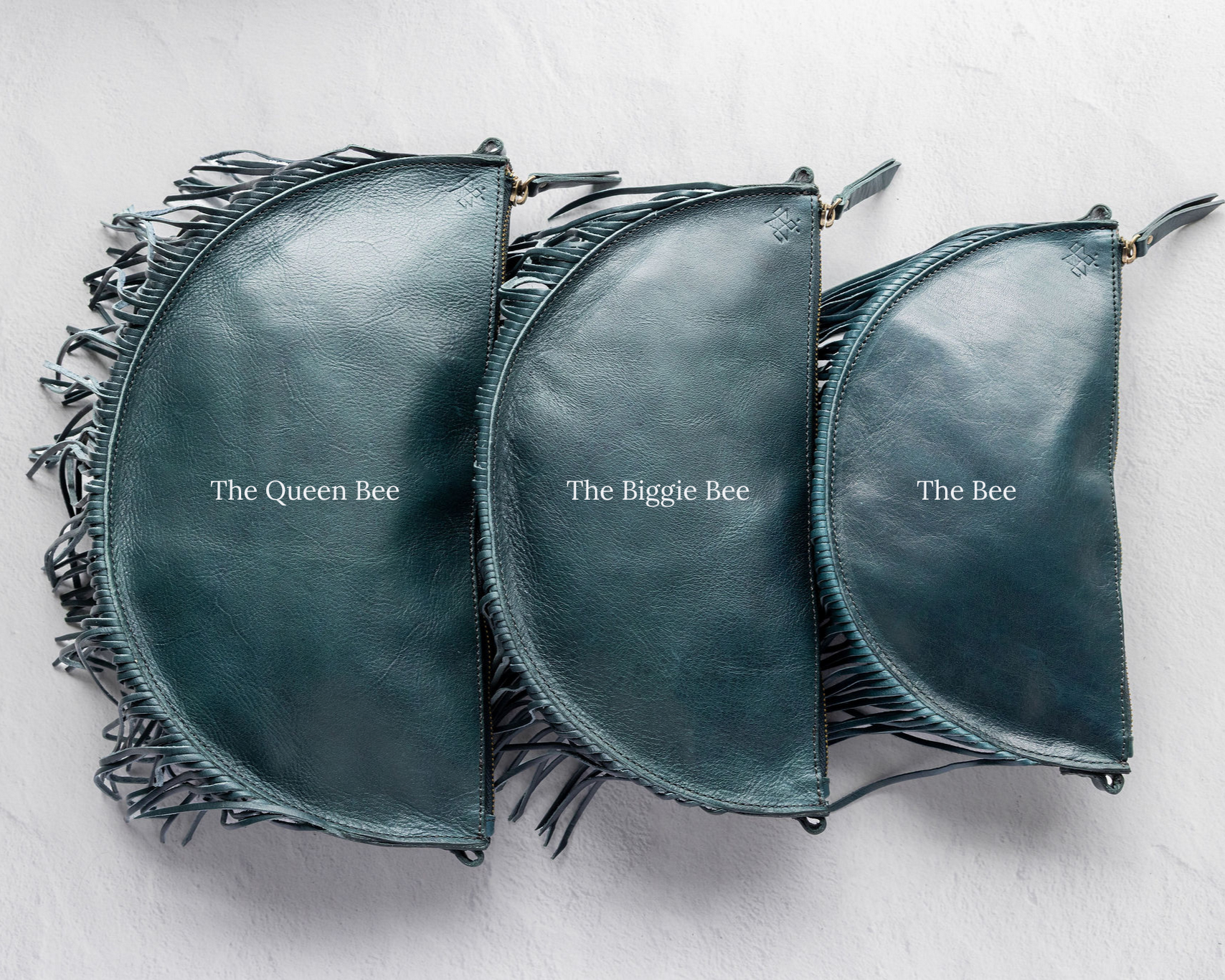 Teal leather fringe crossbody bag, size comparison