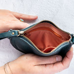 Mini teal leather pouch