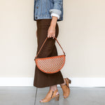 The Woven Terracotta & Seashell Queen Bee, styled