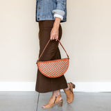 The Woven Terracotta & Seashell Queen Bee, styled
