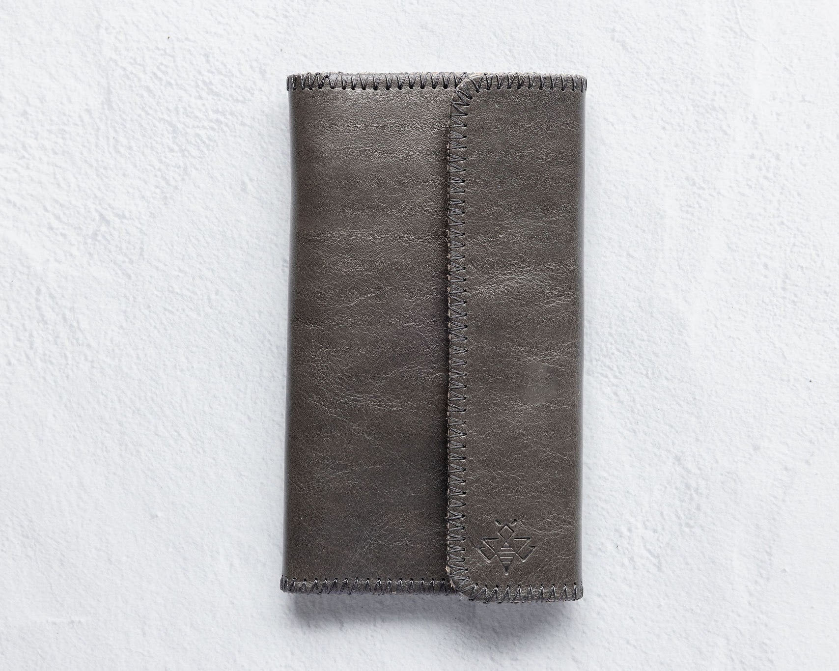 Charcoal leather wallet for traveling