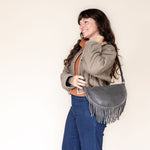 Medium charcoal leather fringe bag, side view