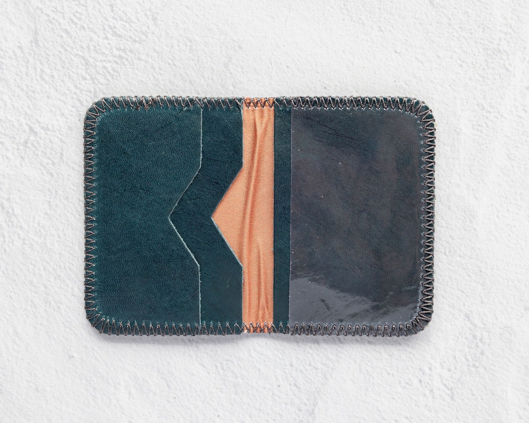 Small teal leather wallet