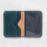 Small teal leather wallet