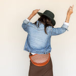 The Woven Terracotta & Seashell Queen Bee worn at the waist