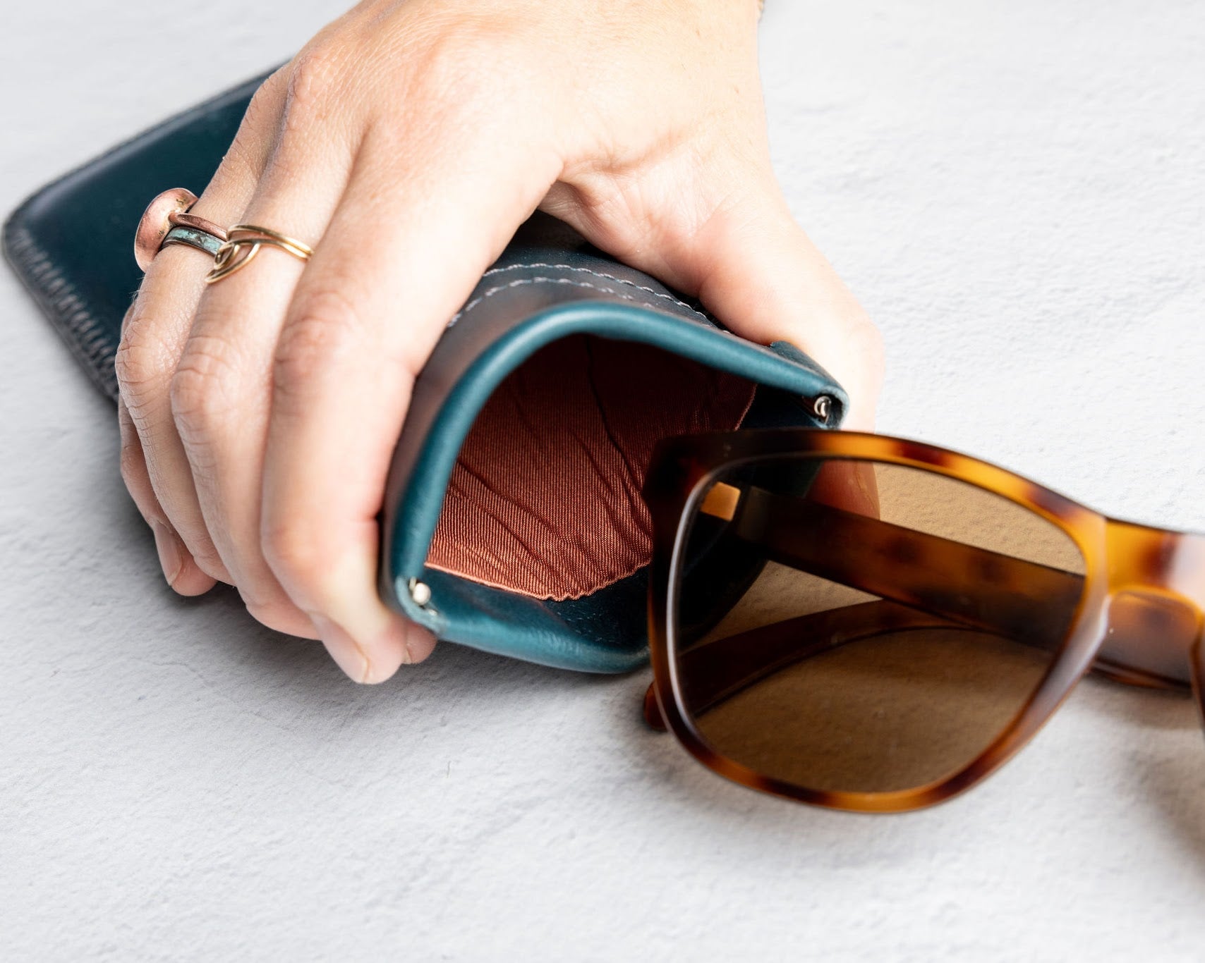 Teal leather sunglass case