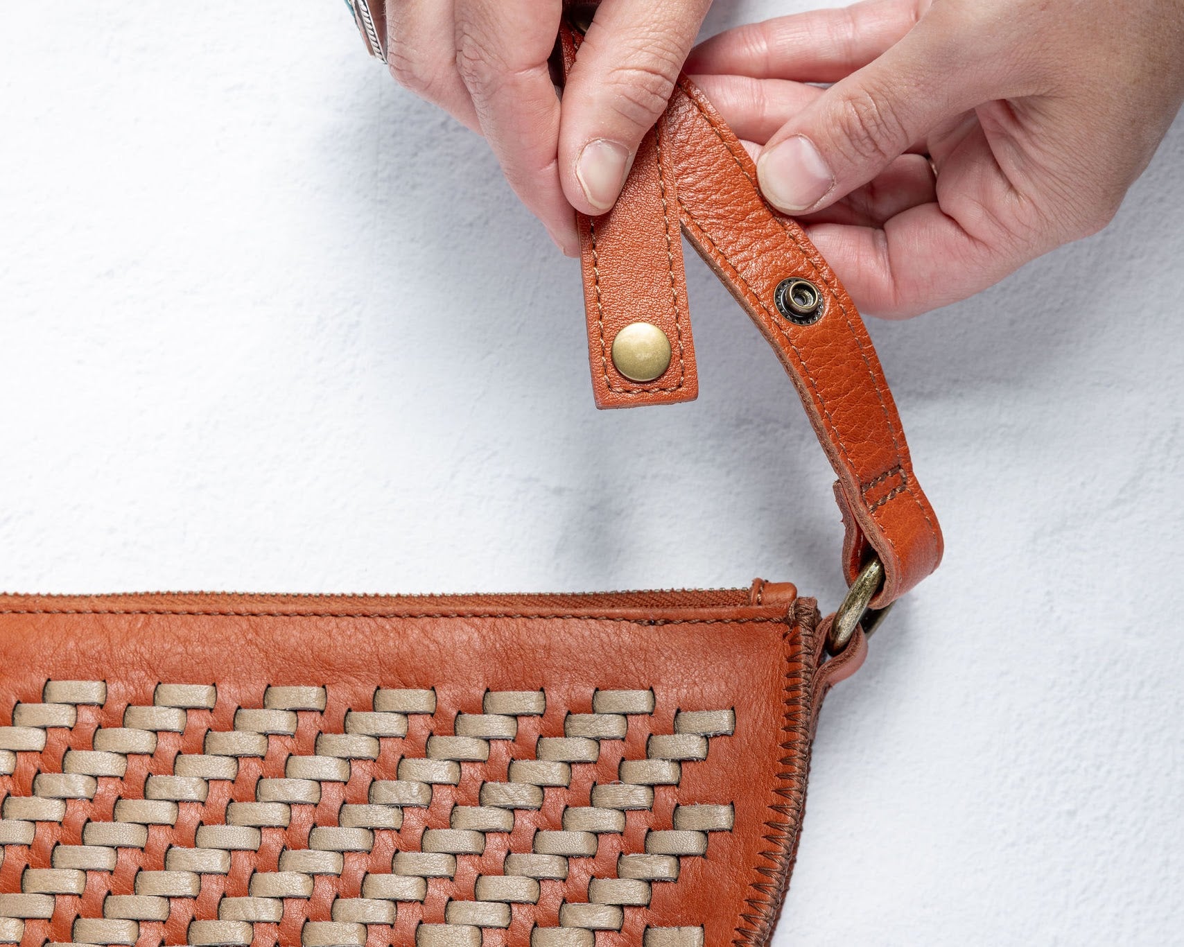 Close-up of the Patented Snap Strap System on the Woven Queen Bee
