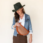 The Woven Terracotta & Seashell Queen Bee worn crossbody