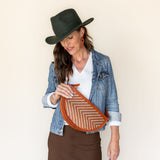 The Woven Terracotta & Seashell Queen Bee worn crossbody