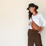 The Woven Terracotta & Seashell Biggie Bee worn across the body