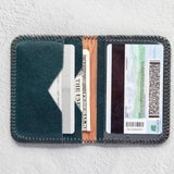 Small teal leather wallet