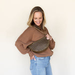 The Woven Sage & Espresso Biggie Bee worn on the shoulder
