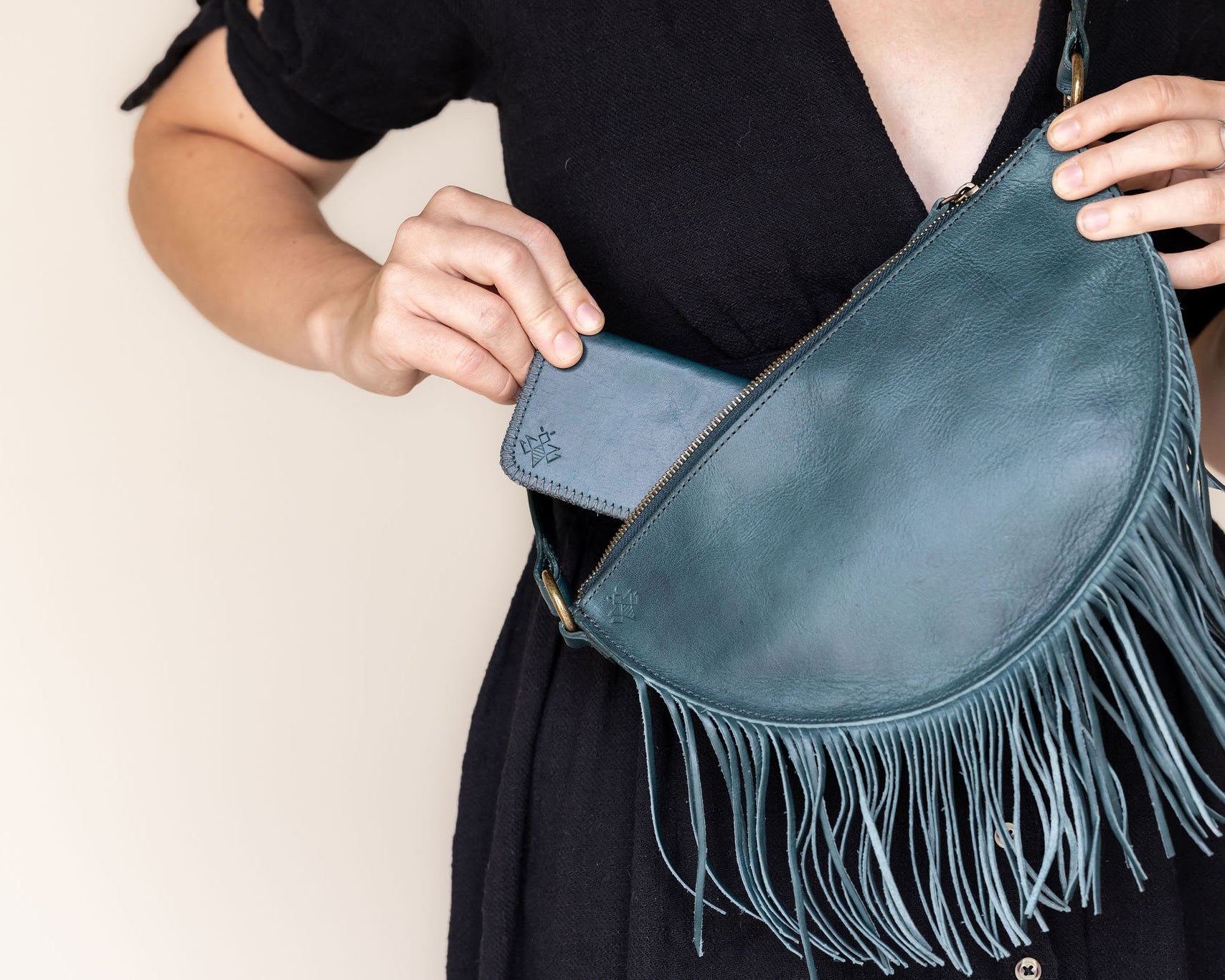 Small teal leather wallet