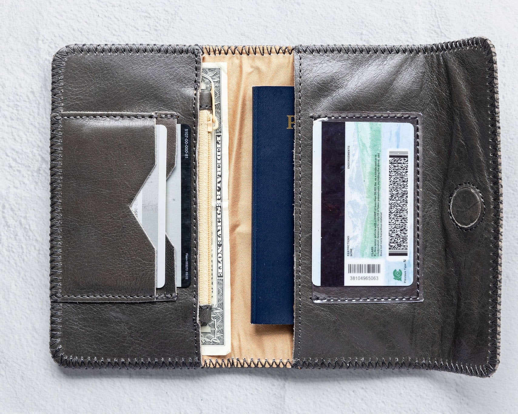 Charcoal leather wallet for traveling