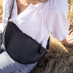 Large black leather bag, sling bag