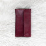 Cherry red leather wallet for traveling
