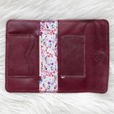 Cherry red leather wallet for traveling