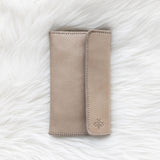 Light tan leather wallet for traveling