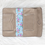 Light tan leather wallet for traveling