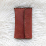 Leather cognac wallet for traveling